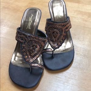 Slightly worn sequence sandals